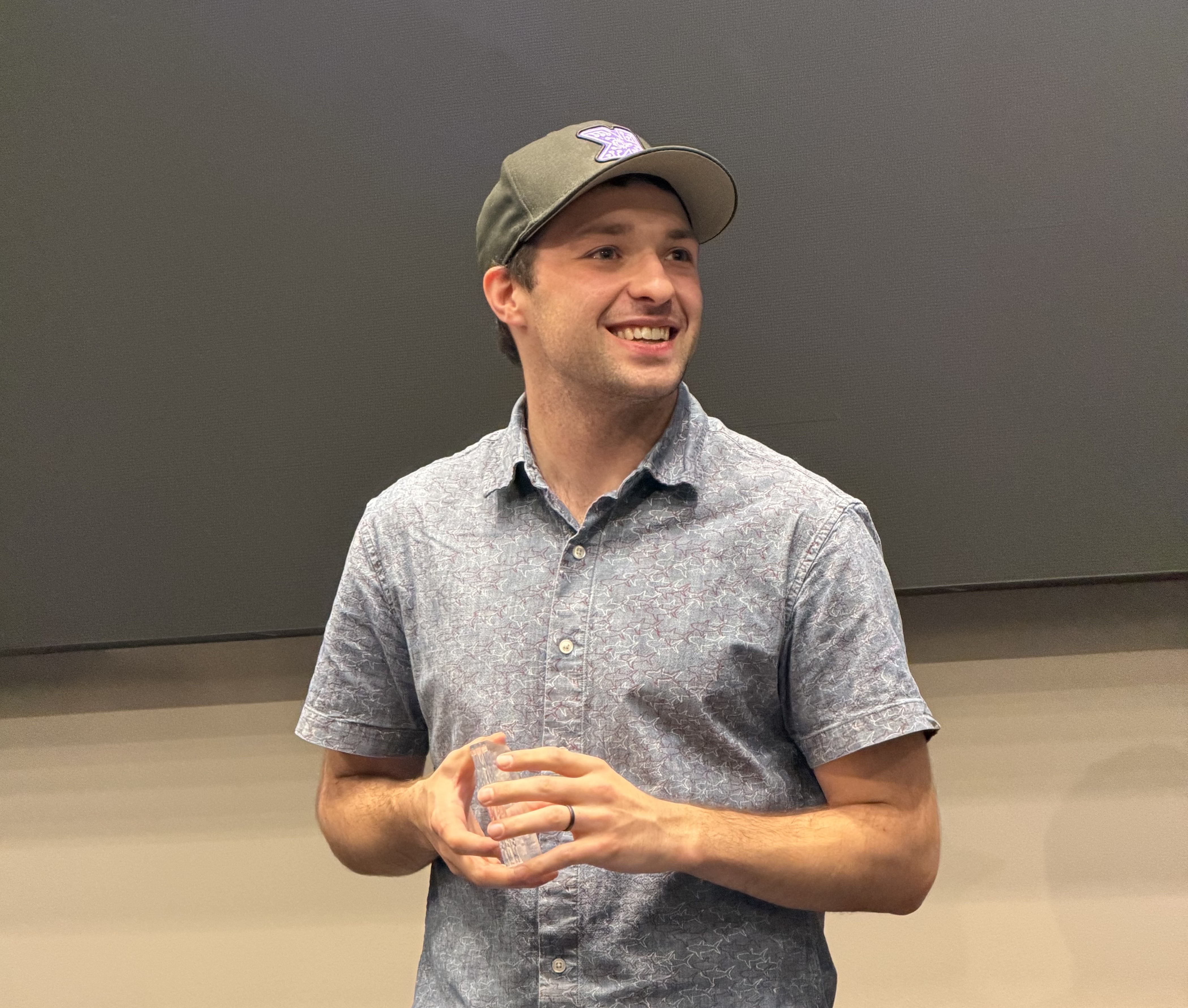 Strikeout presenting at a conference